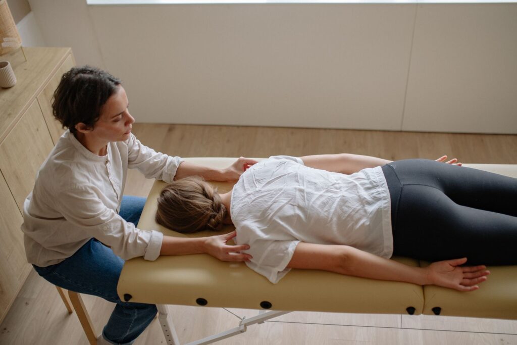 Patient receiving an upper back adjustment